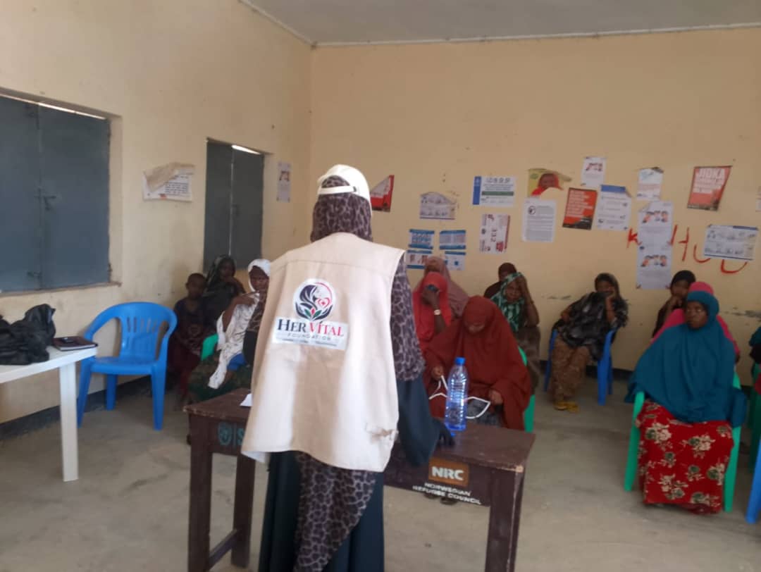 Women and adolescent girls attending a menstrual health and hygiene training